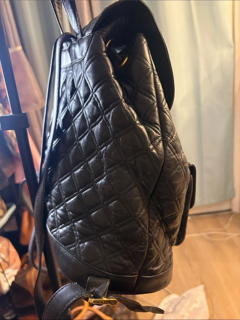 MCM Black Quilted Leather Backpack with Gold Accents